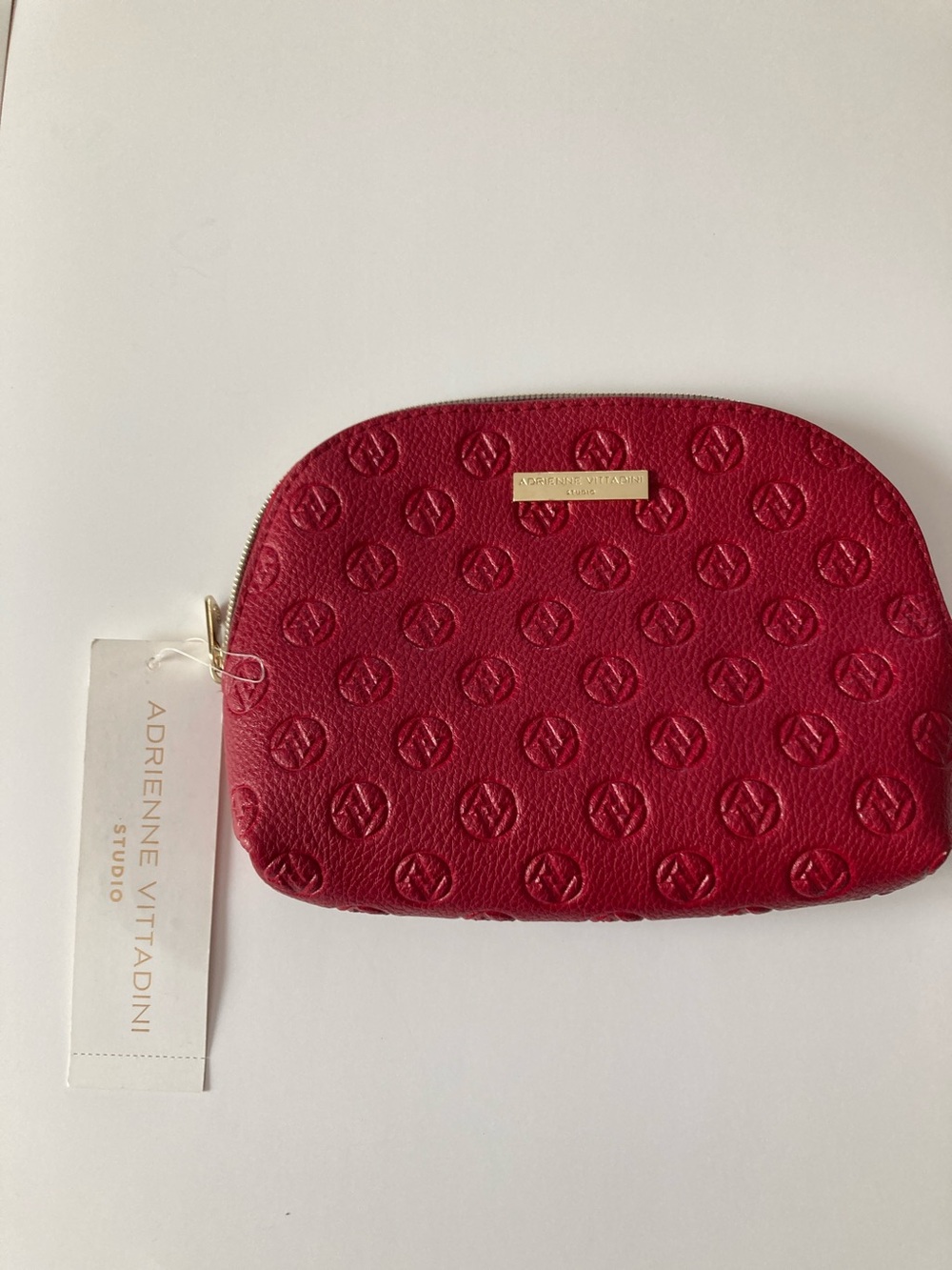 Adrienne Vittadini Studio Burgundy Red Medium Deboss Cosmetic Bag
NWT.
